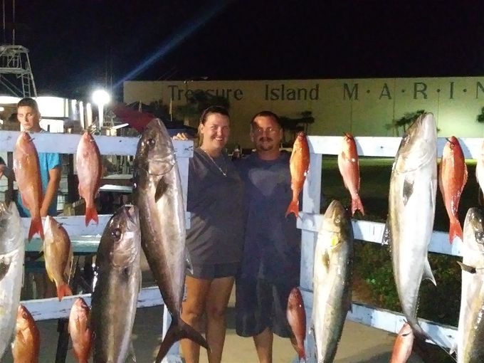 Captain Austin and his wife Tiffany after a day of fun fishing with the family